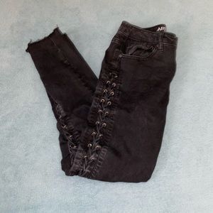 Lace up black cropped skinny jeans